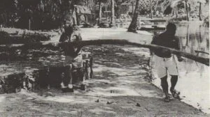 Workers constructing a manmade lagoon