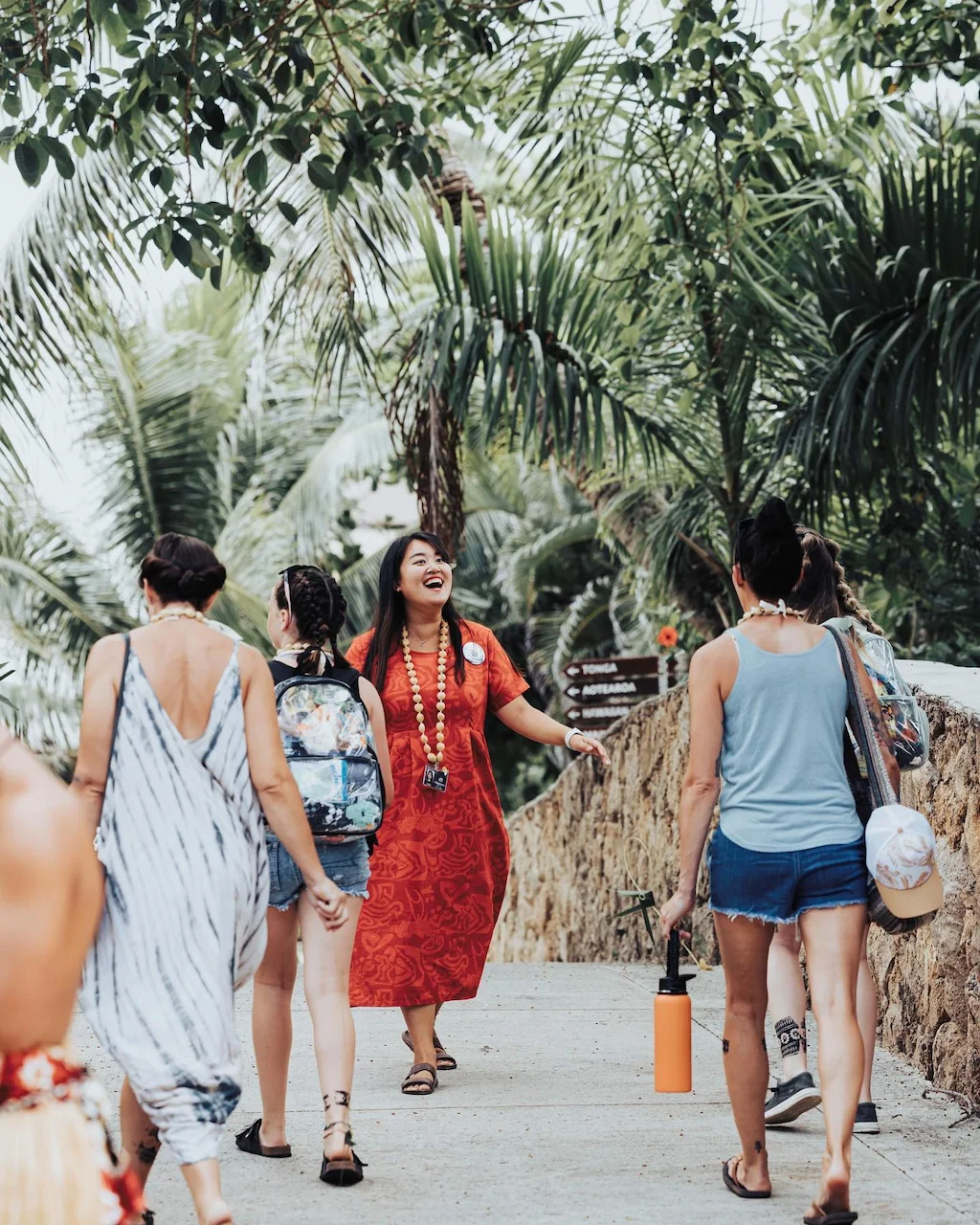 Friendly guide giving Super Ambassador tour to a family.