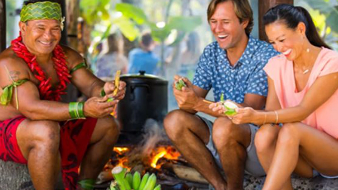 Kap Teo Tafiti from the Samoa Village demonstrates how to peel a banana.