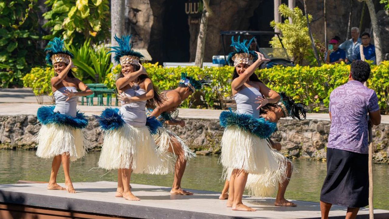 Tahitian dancers showcase their traditional attire and dance. Photo by Polynesian Cultural Center.