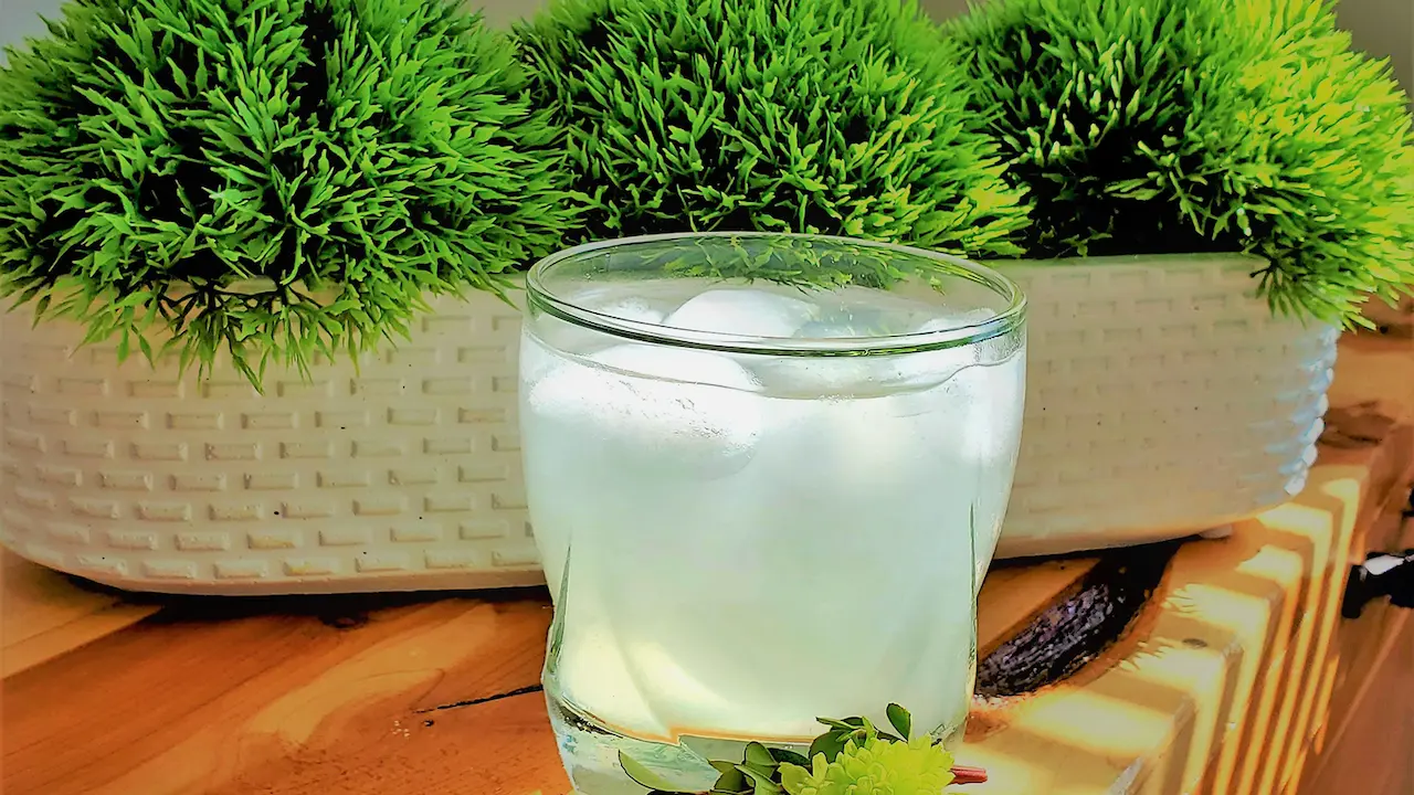 Glass of refreshing ginger lime cooler.