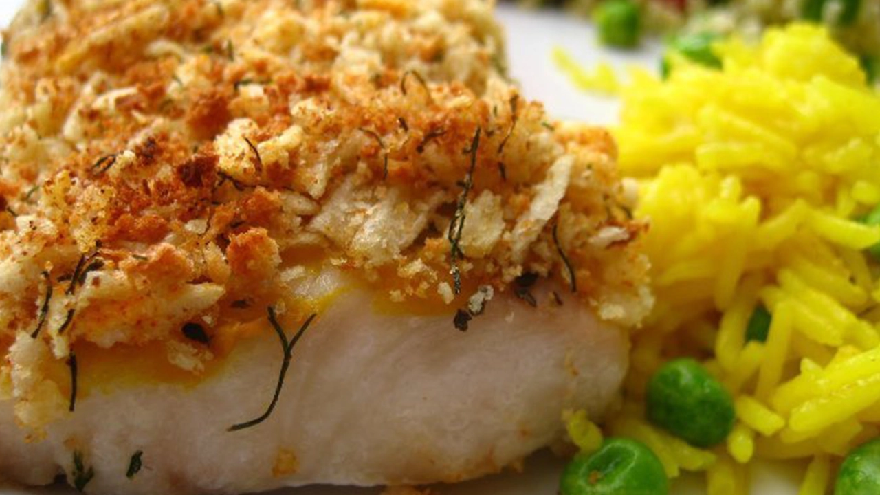 Cooked mahi-mahi filet, crusted with breadcrumbs, seasonings, herbs.