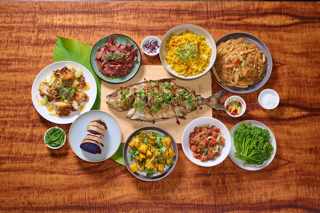 Grilled fish, poke, sweet potato and other delicious food items at the Aliʻi Lūʻau.