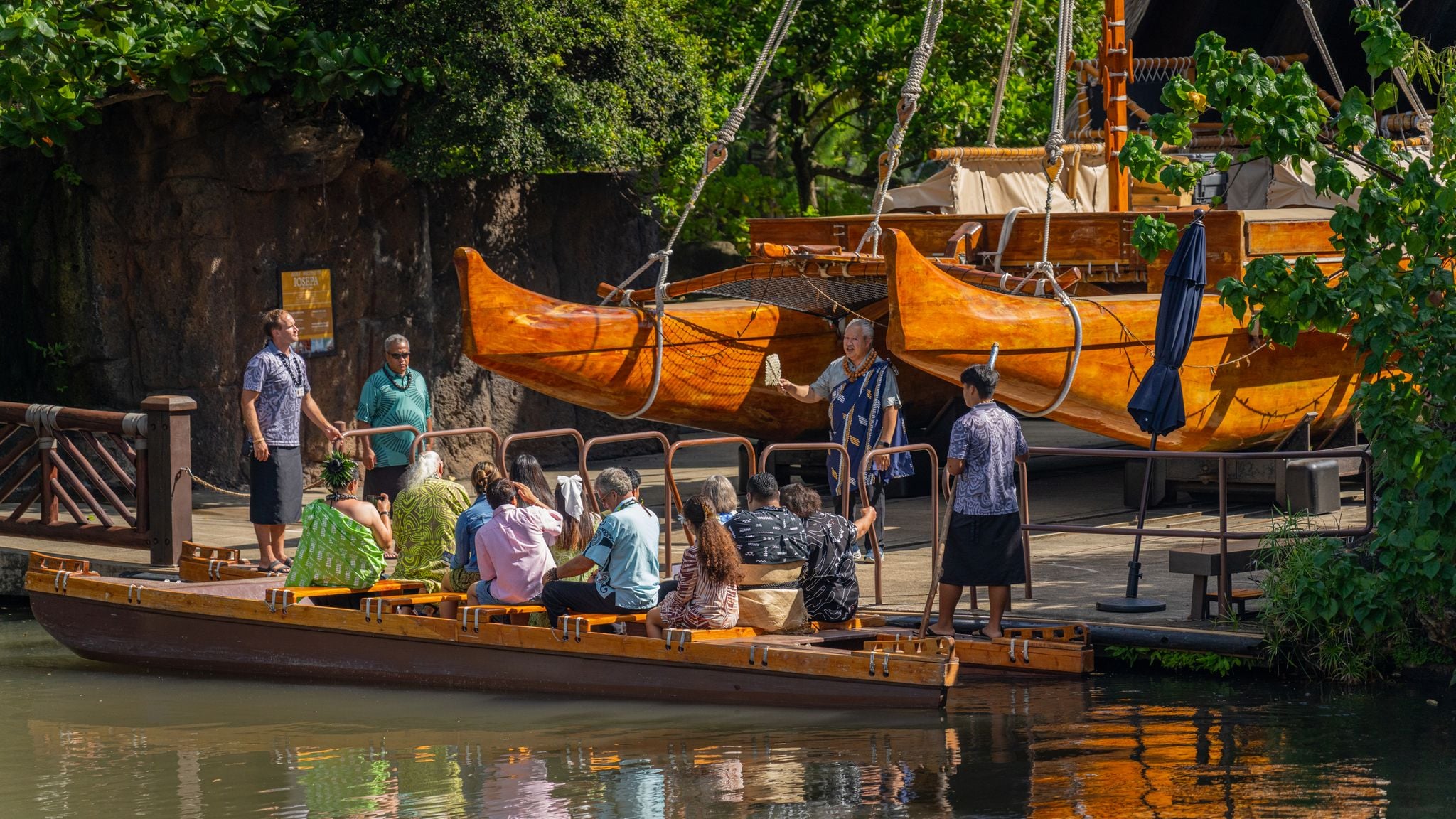 A double-hulled canoe docks in the Hawaiian Village