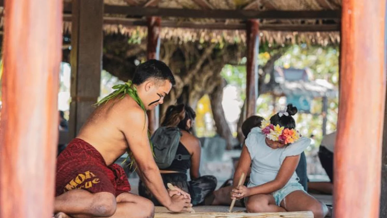 Fire making activity in Samoan Village.