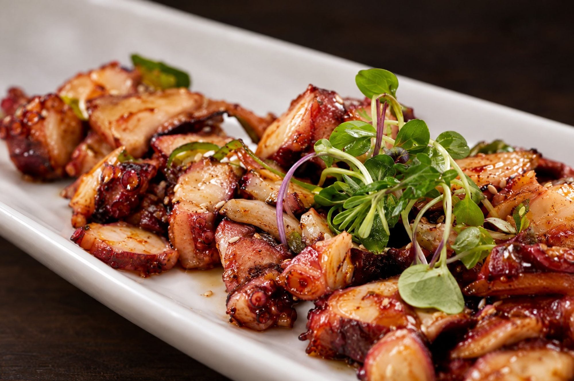 Seared tako with microgreens