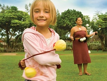 Keiki playing poi balls